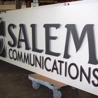 A single faced illuminated cabinet with dimensional lettering and logo.